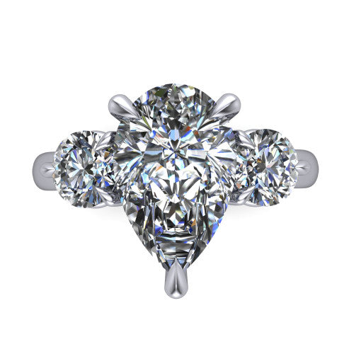 Juniper pear three stone engagement ring in Platinum, top-down view showing the brilliant pear-cut center diamond with two matched round side diamonds