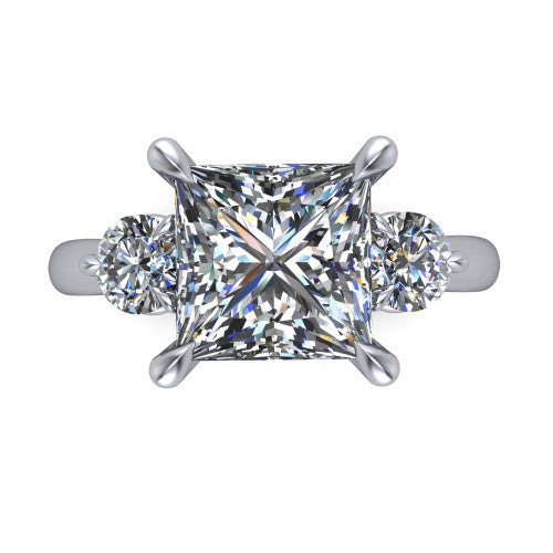 Juniper princess three stone engagement ring in Platinum, top-down view showing the brilliant princess-cut center diamond with two matched round side diamonds