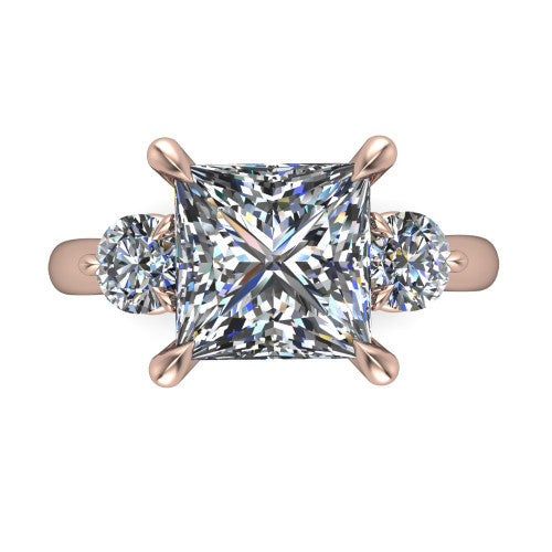 Juniper princess three stone engagement ring in 14K Rose Gold, top-down view showing the brilliant princess-cut center diamond with two matched round side diamonds