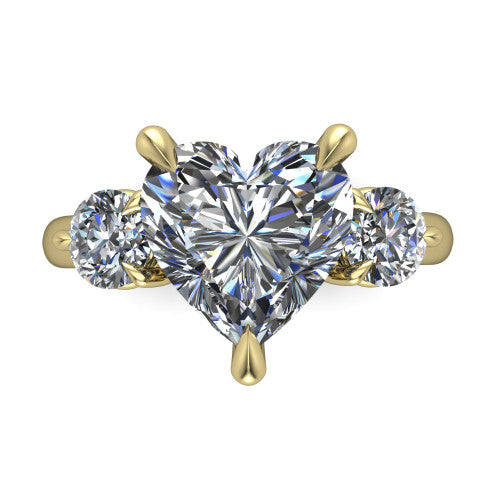 Juniper heart three stone engagement ring in 18K Yellow Gold, top-down view showing the brilliant heart-shaped center diamond with two matched round side diamonds