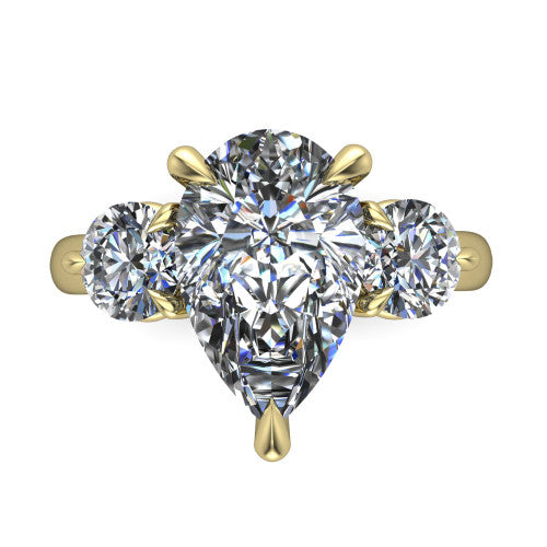 Juniper pear three stone engagement ring in 14K Yellow Gold, top-down view showing the brilliant pear-cut center diamond with two matched round side diamonds