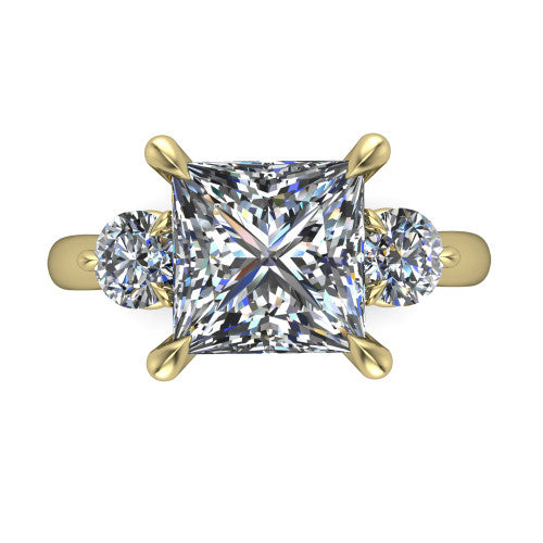 Juniper princess three stone engagement ring in 14K Yellow Gold, top-down view showing the brilliant princess-cut center diamond with two matched round side diamonds