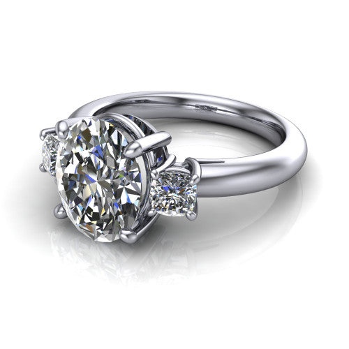 Penelope oval three stone engagement ring in 14K White Gold, three-quarter perspective showing the brilliant oval center diamond, two matched oval side diamonds