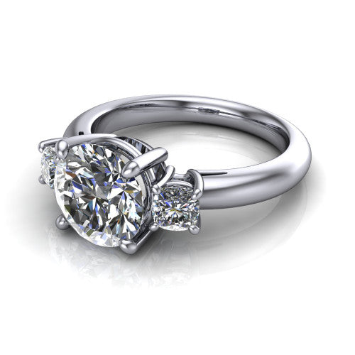Penelope round three stone engagement ring in 14K White Gold, three-quarter perspective showing the brilliant round center diamond, two matched round side diamonds