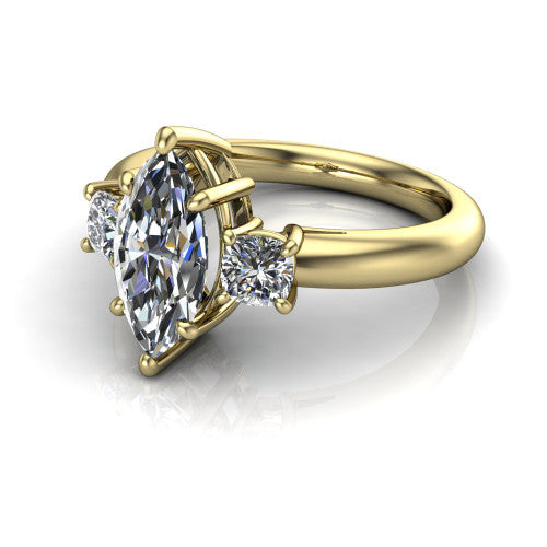 Penelope marquise three stone engagement ring in 14K Yellow Gold, three-quarter perspective showing the brilliant marquise center diamond, two matched marquise side diamonds