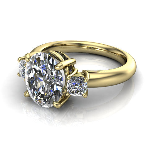 Penelope oval three stone engagement ring in 18K Yellow Gold, three-quarter perspective showing the brilliant oval center diamond, two matched oval side diamonds