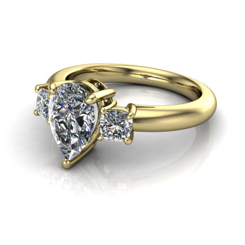 Penelope pear three stone engagement ring in 18K Yellow Gold, three-quarter perspective showing the brilliant pear-cut center diamond, two matched pear-cut side diamonds