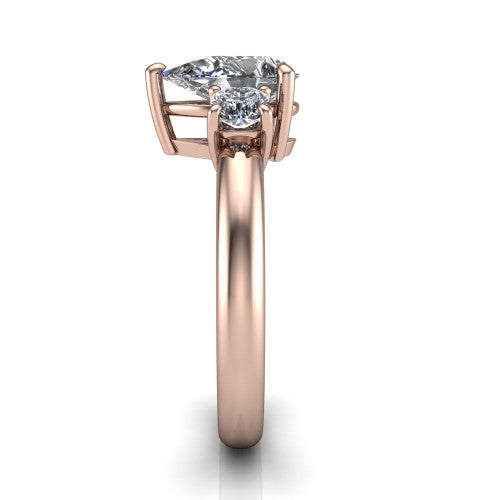 Penelope pear three stone engagement ring in 14K Rose Gold, side profile showing the tall straight-sided basket and slim polished band
