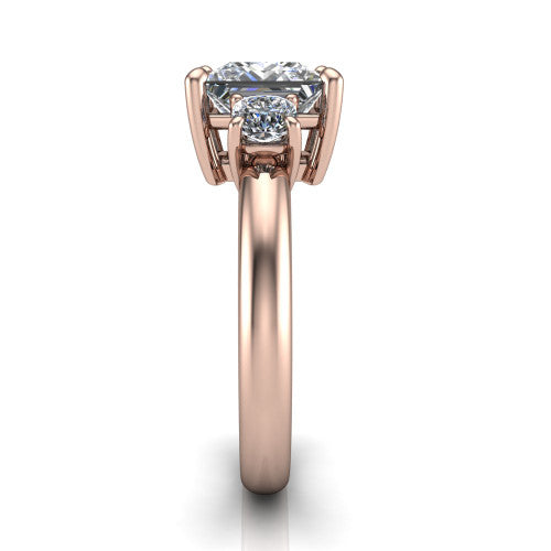 Penelope princess three stone engagement ring in 14K Rose Gold, side profile showing the tall straight-sided basket and slim polished band