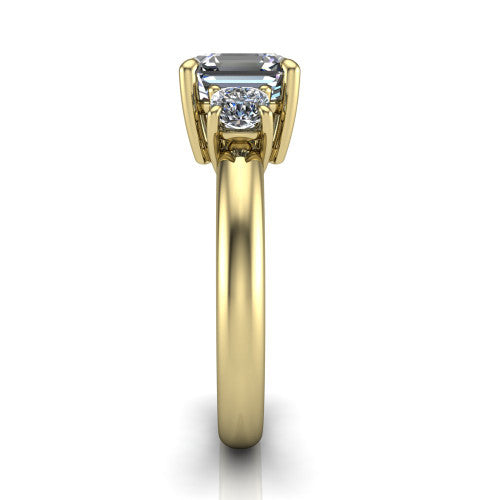 Penelope square emerald three stone engagement ring in 14K Yellow Gold, side profile showing the tall straight-sided basket and slim polished band