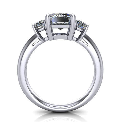 Penelope emerald three stone engagement ring in 14K White Gold, through-finger front profile showing the three-stone head, tall basket, and open under-gallery