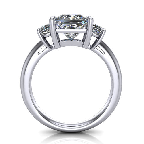 Penelope princess three stone engagement ring in Platinum, through-finger front profile showing the three-stone head, tall basket, and open under-gallery