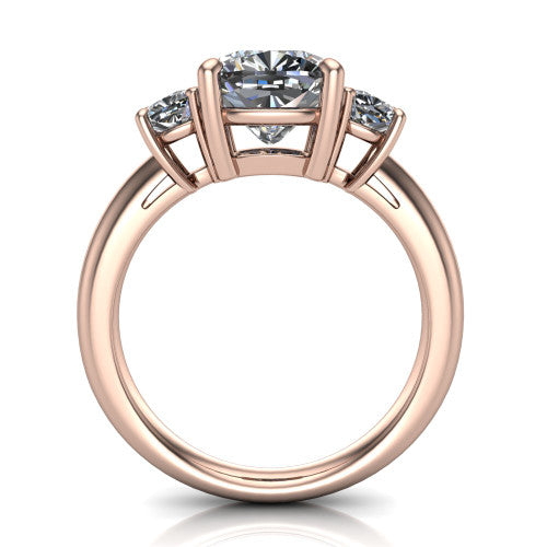 Penelope cushion three stone engagement ring in 14K Rose Gold, through-finger front profile showing the three-stone head, tall basket, and open under-gallery