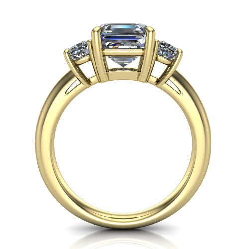 Penelope square emerald three stone engagement ring in 14K Yellow Gold, through-finger front profile showing the three-stone head, tall basket, and open under-gallery
