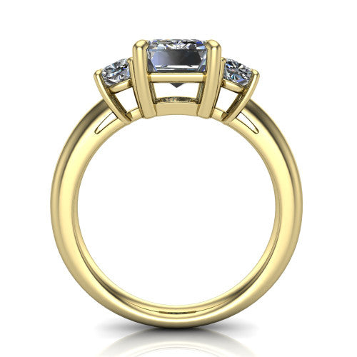 Penelope emerald three stone engagement ring in 14K Yellow Gold, through-finger front profile showing the three-stone head, tall basket, and open under-gallery