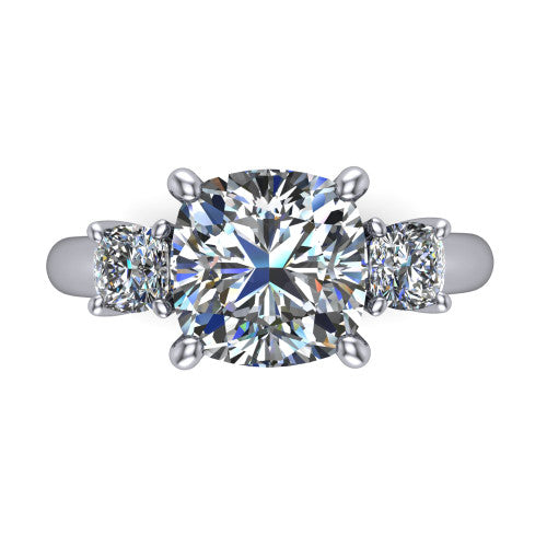 Penelope cushion three stone engagement ring in Platinum, top-down view showing the brilliant cushion-cut center diamond, two matched cushion-cut side diamonds aligned across the band