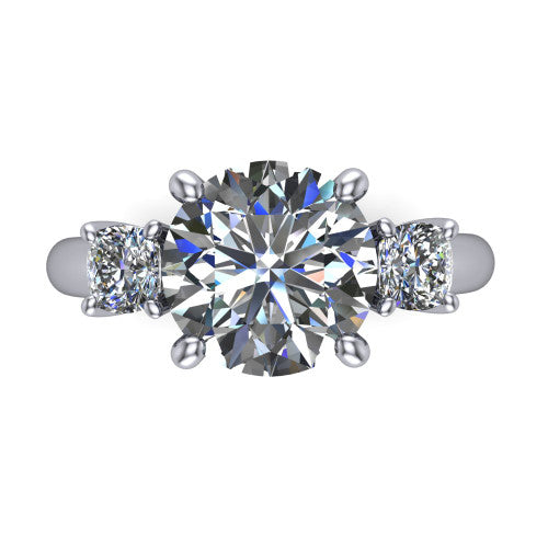 Penelope round three stone engagement ring in 18K White Gold, top-down view showing the brilliant round center diamond, two matched round side diamonds aligned across the band