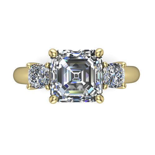 Penelope square emerald three stone engagement ring in 18K Yellow Gold, top-down view showing the step-cut square emerald center diamond, two matched square emerald side diamonds aligned across the band