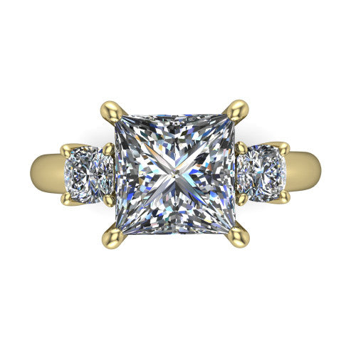 Penelope princess three stone engagement ring in 18K Yellow Gold, top-down view showing the brilliant princess-cut center diamond, two matched princess-cut side diamonds aligned across the band