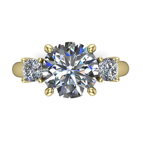 Penelope round three stone engagement ring in 18K Yellow Gold, top-down view showing the brilliant round center diamond, two matched round side diamonds aligned across the band