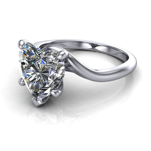 Awren heart solitaire engagement ring in Platinum, three-quarter perspective showing the brilliant heart-shaped center diamond on a bypass crossover shank