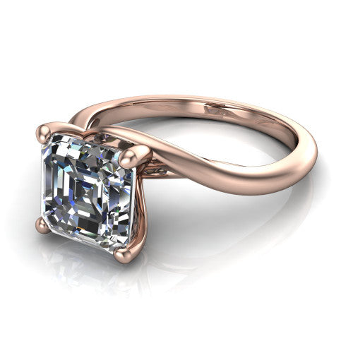 Awren square emerald solitaire engagement ring in 18K Rose Gold, three-quarter perspective showing the step-cut square emerald center diamond on a bypass crossover shank