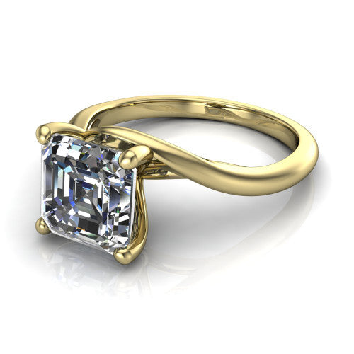 Awren square emerald solitaire engagement ring in 18K Yellow Gold, three-quarter perspective showing the step-cut square emerald center diamond on a bypass crossover shank
