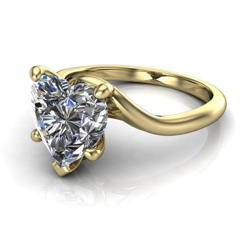 Awren heart solitaire engagement ring in 14K Yellow Gold, three-quarter perspective showing the brilliant heart-shaped center diamond on a bypass crossover shank