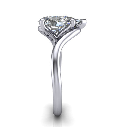 Awren pear solitaire engagement ring in 18K White Gold, side profile showing the bypass crossover shank and slim polished band