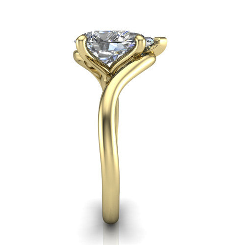 Awren pear solitaire engagement ring in 14K Yellow Gold, side profile showing the bypass crossover shank and slim polished band