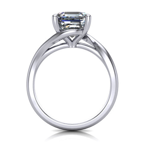 Awren square emerald solitaire engagement ring in Platinum, through-finger front profile showing the bypass arms crossing beneath the head and open under-gallery