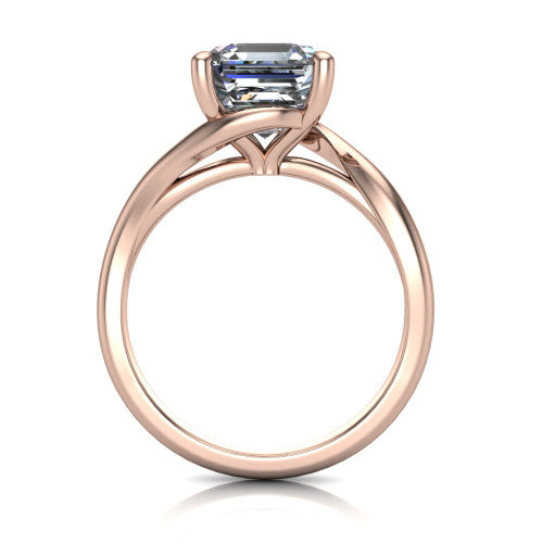 Awren square emerald solitaire engagement ring in 14K Rose Gold, through-finger front profile showing the bypass arms crossing beneath the head and open under-gallery