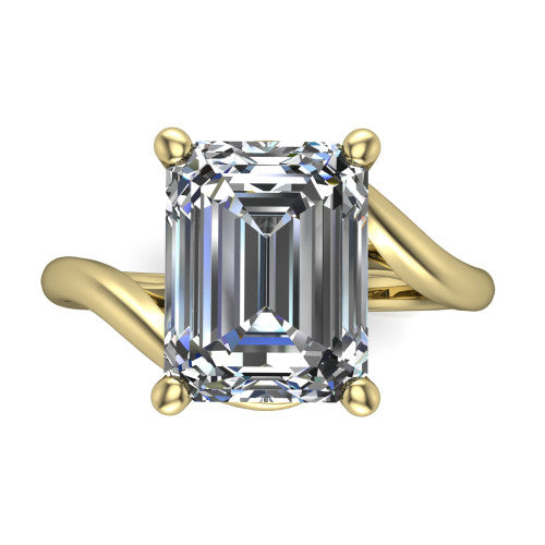 Awren emerald solitaire engagement ring in 14K Yellow Gold, top-down view showing the step-cut emerald center diamond above the split bypass arms