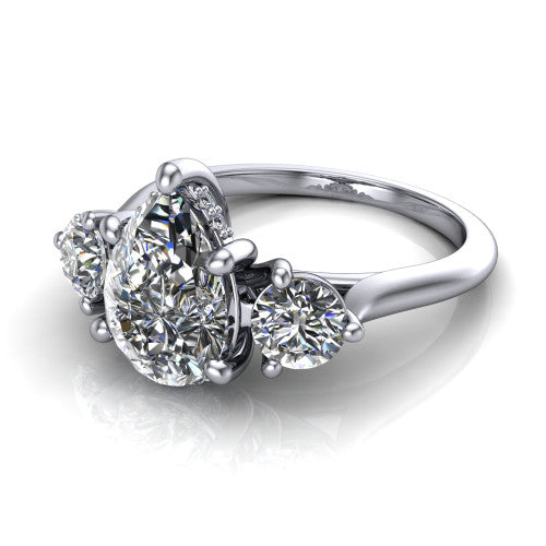 Edith pear hidden halo engagement ring in 14K White Gold, three-quarter perspective showing the brilliant pear-cut center diamond flanked by two round side diamonds with a hidden pave halo beneath the center stone