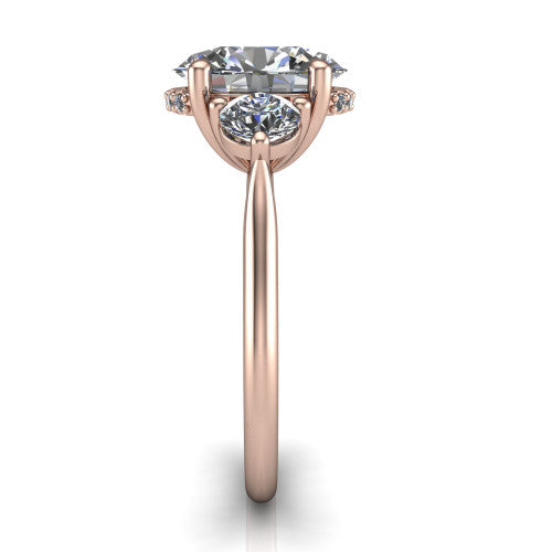 Edith oval hidden halo engagement ring in 18K Rose Gold, side profile showing the tall basket, hidden pave halo beneath the center stone, and slim polished band