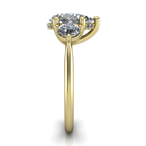Edith pear hidden halo engagement ring in 14K Yellow Gold, side profile showing the tall basket, hidden pave halo beneath the center stone, and slim polished band