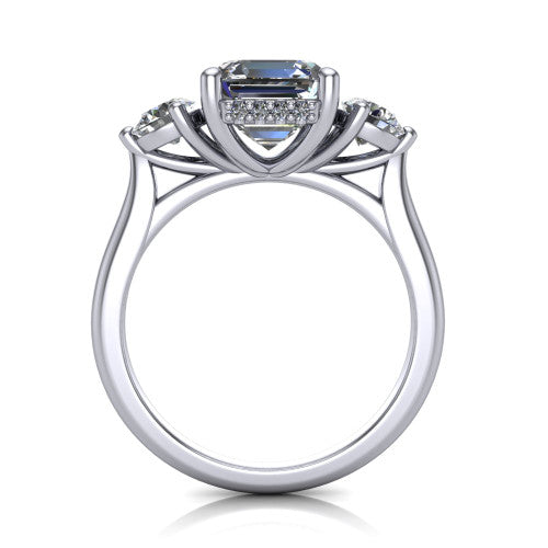 Edith square emerald hidden halo engagement ring in Platinum, through-finger front profile showing the three-stone head and tall basket with hidden halo visible from the side
