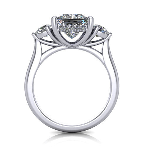 Edith princess hidden halo engagement ring in Platinum, through-finger front profile showing the three-stone head and tall basket with hidden halo visible from the side
