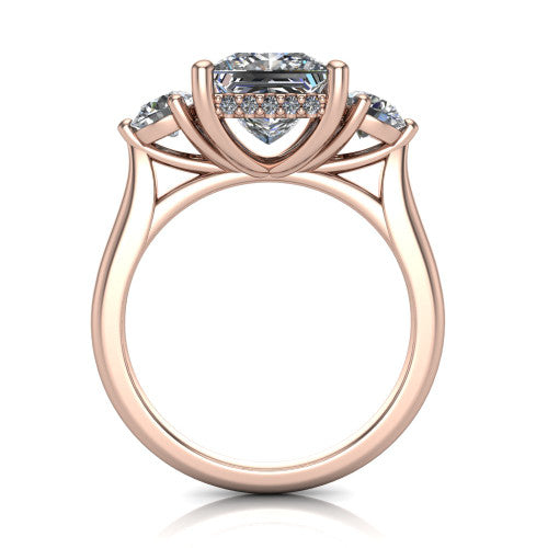 Edith princess hidden halo engagement ring in 14K Rose Gold, through-finger front profile showing the three-stone head and tall basket with hidden halo visible from the side
