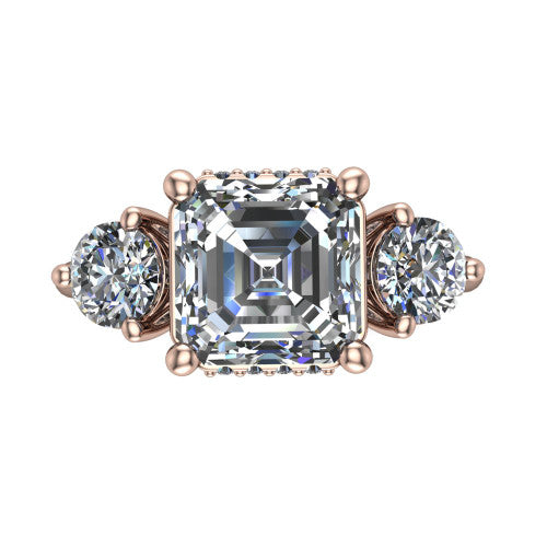 Edith square emerald hidden halo engagement ring in 18K Rose Gold, top-down view showing the step-cut square emerald center diamond with two matched round side diamonds and the hidden pave halo peeking from beneath
