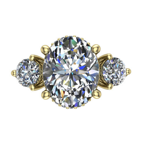 Edith oval hidden halo engagement ring in 18K Yellow Gold, top-down view showing the brilliant oval center diamond with two matched round side diamonds and the hidden pave halo peeking from beneath