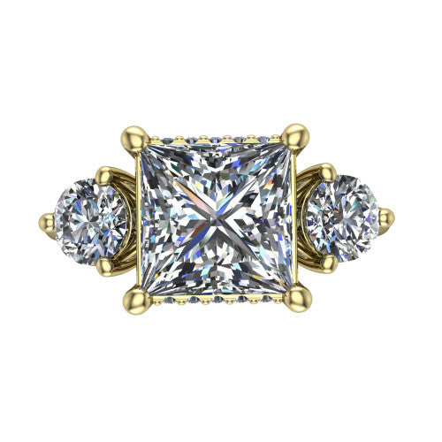 Edith princess hidden halo engagement ring in 18K Yellow Gold, top-down view showing the brilliant princess-cut center diamond with two matched round side diamonds and the hidden pave halo peeking from beneath