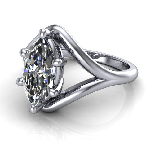 Margot marquise solitaire engagement ring in Platinum, three-quarter perspective showing the brilliant marquise center diamond on a marquise leaf split shank