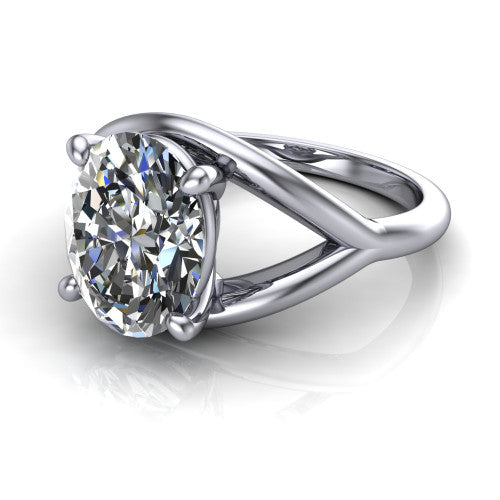 Margot oval solitaire engagement ring in 14K White Gold, three-quarter perspective showing the brilliant oval center diamond on a marquise leaf split shank