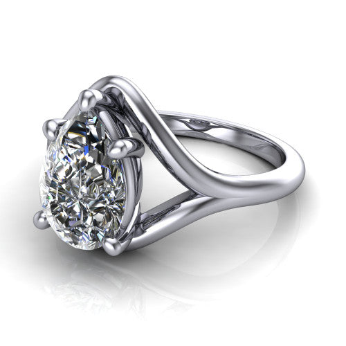Margot pear solitaire engagement ring in 18K White Gold, three-quarter perspective showing the brilliant pear-cut center diamond on a marquise leaf split shank