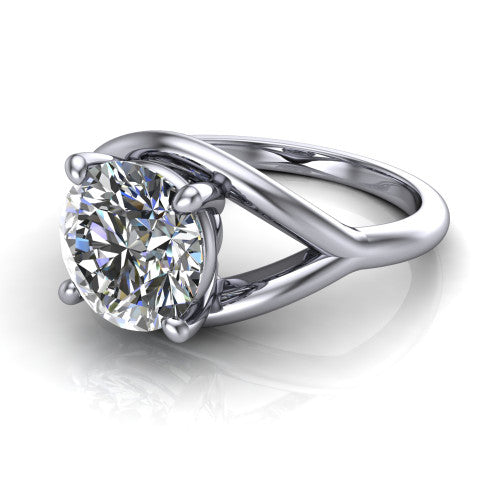Margot round solitaire engagement ring in 18K White Gold, three-quarter perspective showing the brilliant round center diamond on a marquise leaf split shank