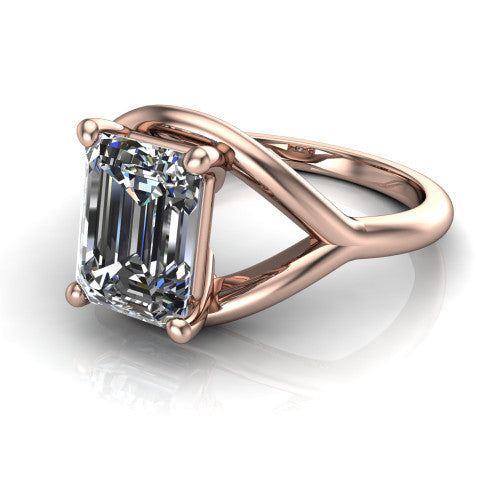 Margot emerald solitaire engagement ring in 14K Rose Gold, three-quarter perspective showing the step-cut emerald center diamond on a marquise leaf split shank