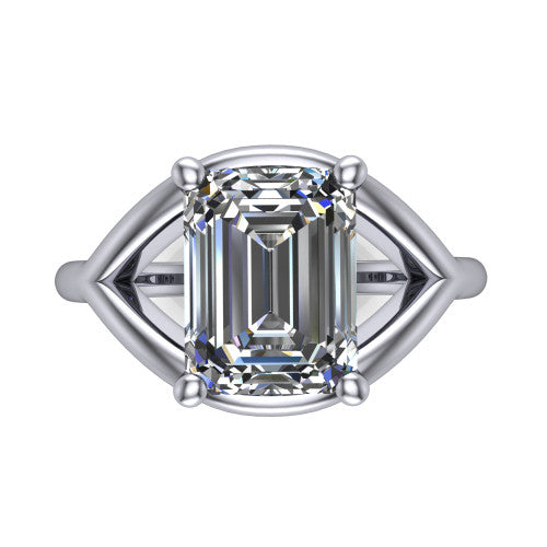 Margot emerald solitaire engagement ring in 18K White Gold, top-down view showing the step-cut emerald center diamond framed by pointed marquise-shaped open shoulders