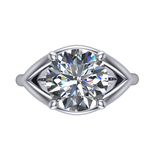 Margot round solitaire engagement ring in Platinum, top-down view showing the brilliant round center diamond framed by pointed marquise-shaped open shoulders