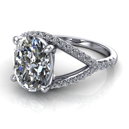 Clementine oval classic engagement ring in 14K White Gold, three-quarter perspective showing the prong-set center above a pav&eacute; bypass split shank
